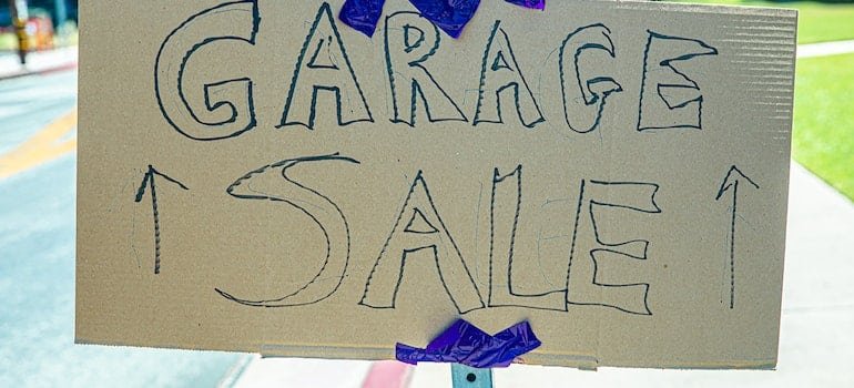 A sign for a garage sale